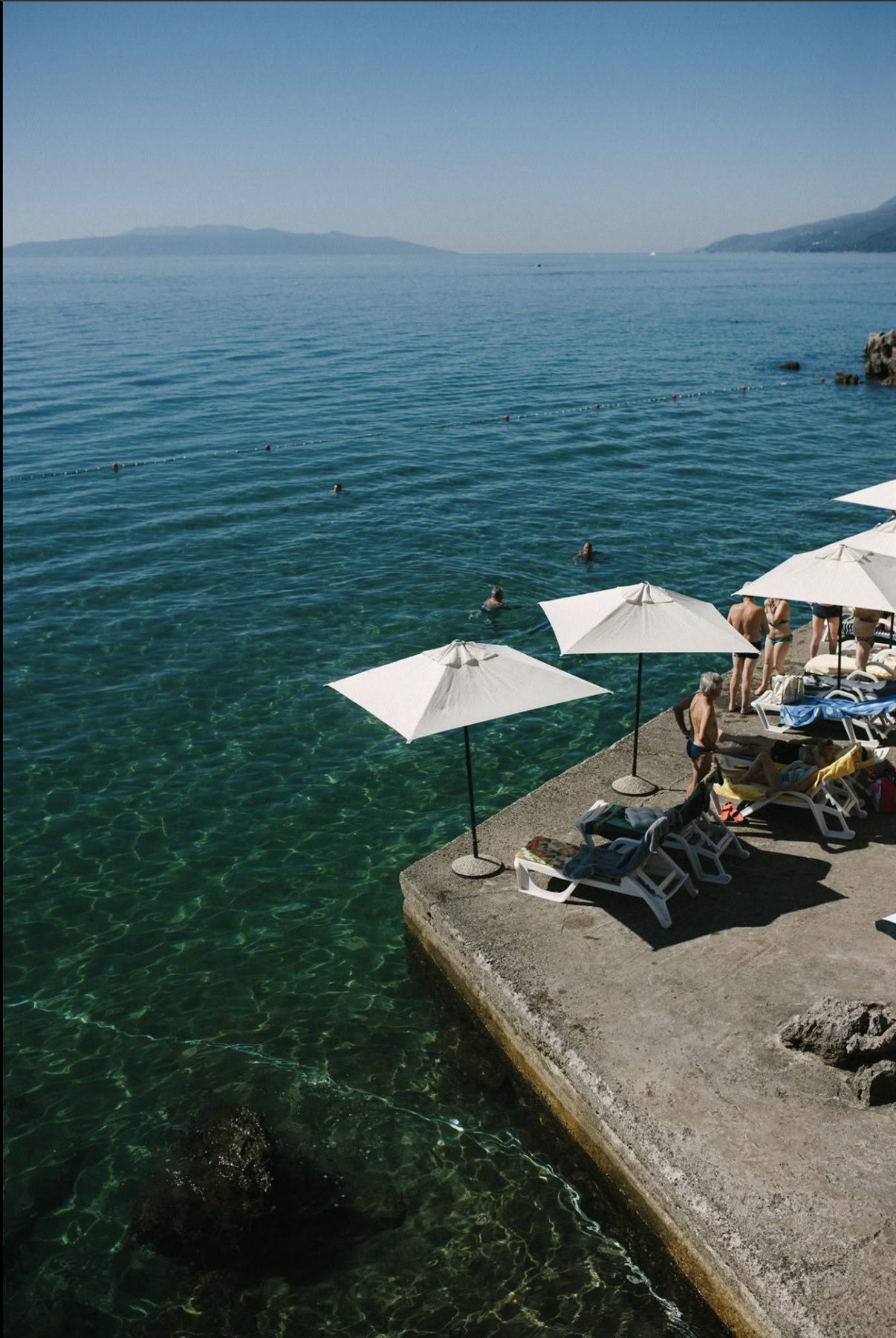 A rocky beach club along the Croatian coast, the kind of setting suited to a coastal ceremony