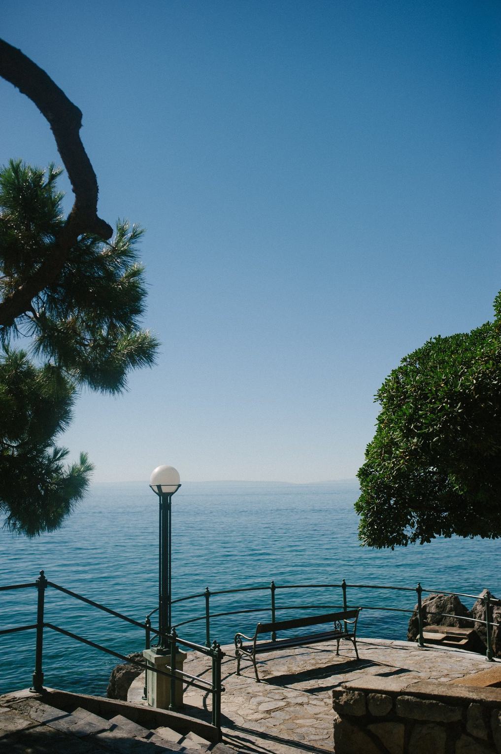 A quiet stone terrace overlooking the Adriatic coastline in Croatia