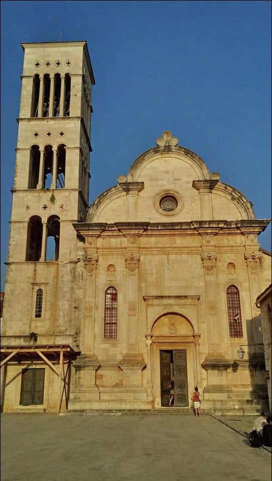 A historic stone church bell tower in Hvar, Croatia